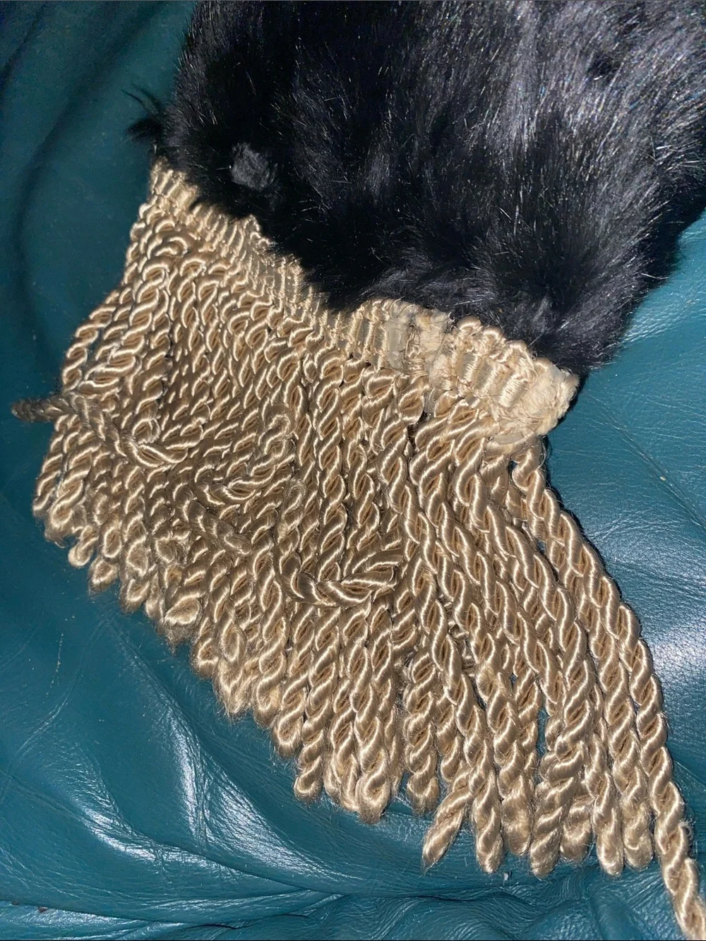 Luxurious Black Fur Throw Pillow with Gold Fringe